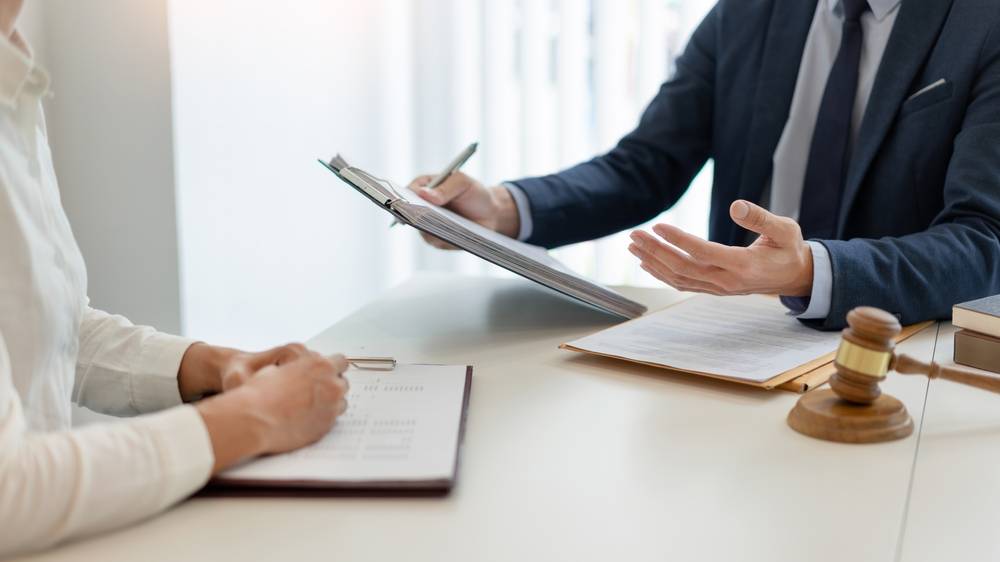 Photo of people at desk