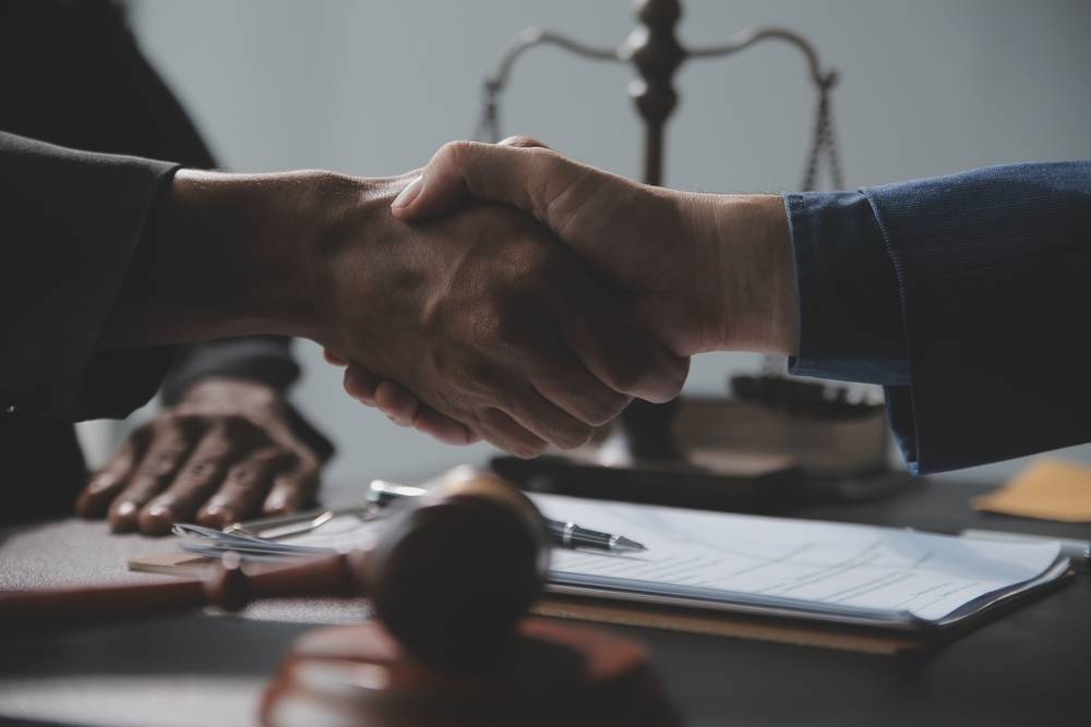 Photo of people shaking hands